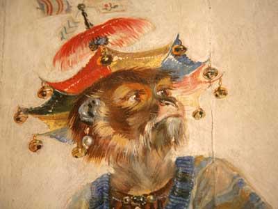 The Grande Singerie, or “monkey room,” is adorned with whimsical paintings of costumed monkeys imitating humans, painted by Christophe Huet (1700-1759), a student of Claude Gillot.