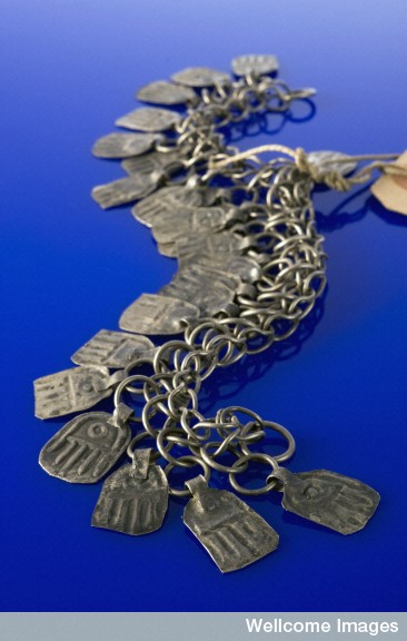 L0057649 Part of a silver necklace decorated with the 'hand of Fatima