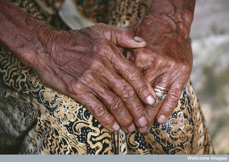 N0026595 Life in rural Indonesia. Baby care - gentle hands.