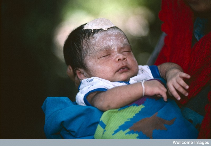 N0026601 Life in rural Indonesia, blessing a newborn child