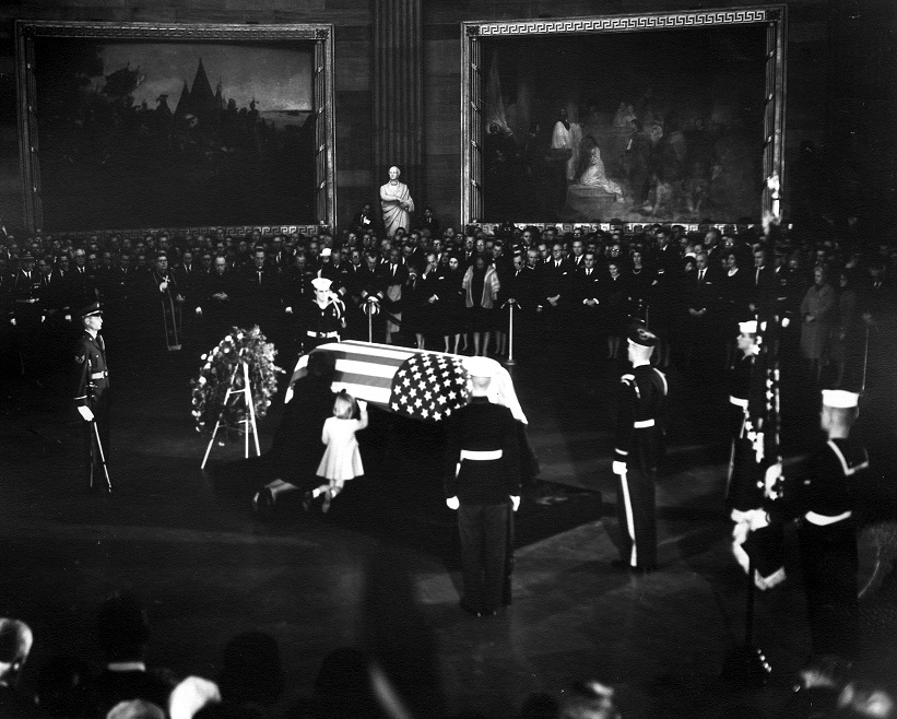 November 1963 : President Kennedy's wife and daughter kneel at the casket as the President's body lies in state in the Rotunda of the Capitol Building.  Photo credit: Abbie Rowe, National Park Service / John Fitzgerald Kennedy Library, Boston.