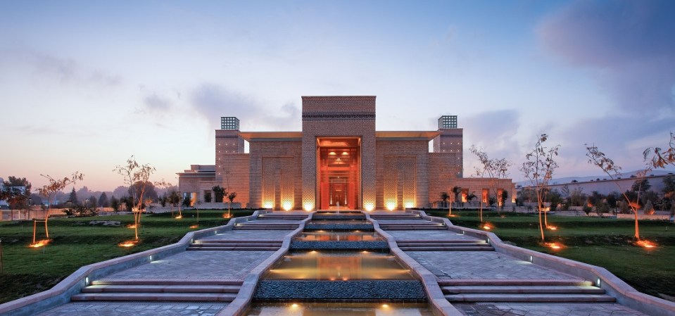 A view of landscaped gardens and cascading waterfall at the Ismaili Centre in Dushanbe. Photo: FNDA Architecture Inc. Copyright.