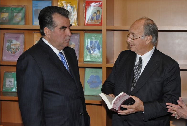 President Rahmon and His Highness the Aga Khan pause in the library of the new Ismaili Centre in Dushanbe. They engage over Alice Hunsberger's "The Ruby of Badakhshan", a fascinating study about the renowned poet and Ismaili philosopher, Nasir Khusraw, who lived over a thousand years ago in the region that is modern Tajikistan. Photo: Moez Visram/The Ismaili.