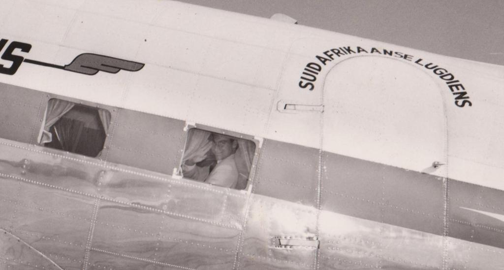 In May 1958, Mawlana Hazar Imam, His Highness the Aga Khan, 49th Imam of Shia Imami Ismaili Muslims, visited his followers in South Africa, Mozambique and Madagascar. Here he is seen waving from a South African Airways plane as he departs the former Portuguese colonial city of Lourenço Marques (now Maputo), Mozambique, following a 3 day visit. Photo: Jehangir Merchant collection