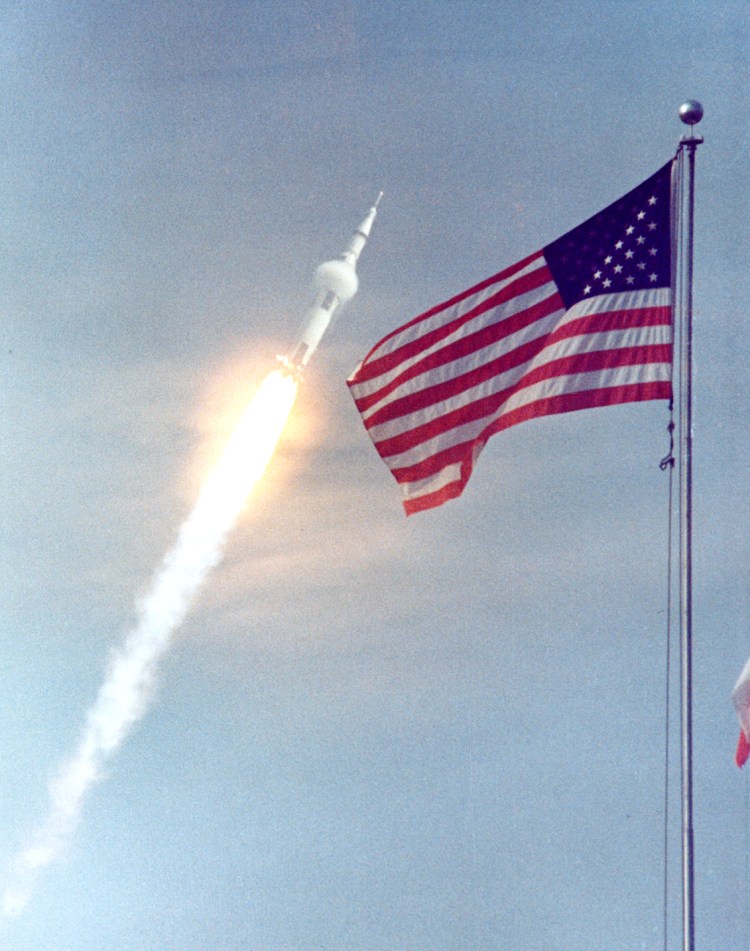 ap11-KSC-69PC-397_Apollo 11 climbs toward orbit