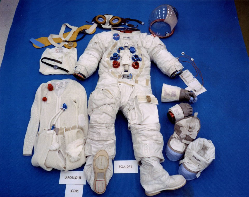 ap11-S69-38889_table-top view of Neil Armstrong's lunar EVA suit