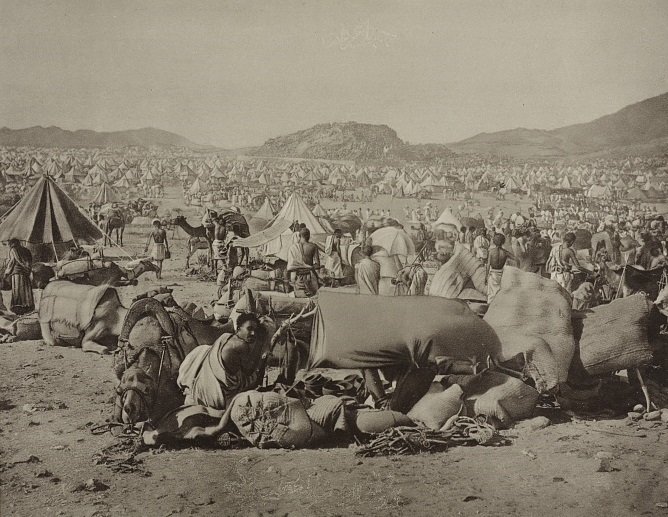 35482v_pilgrims with camels and livestock gathered at a rest station near ʻArafah east of Mecca