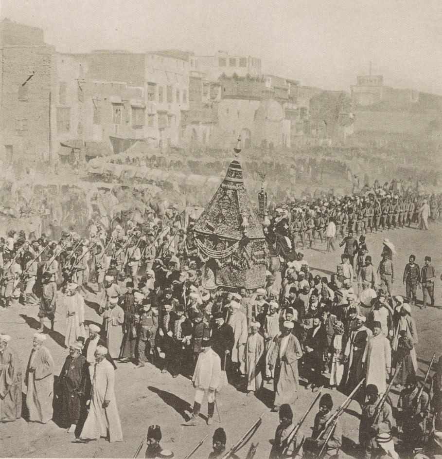 38159v_a view of a caravan of dignitaries and soldiers with the palaquin Mahmal in al-Manākha Square on its way to Mecca for the Hajj