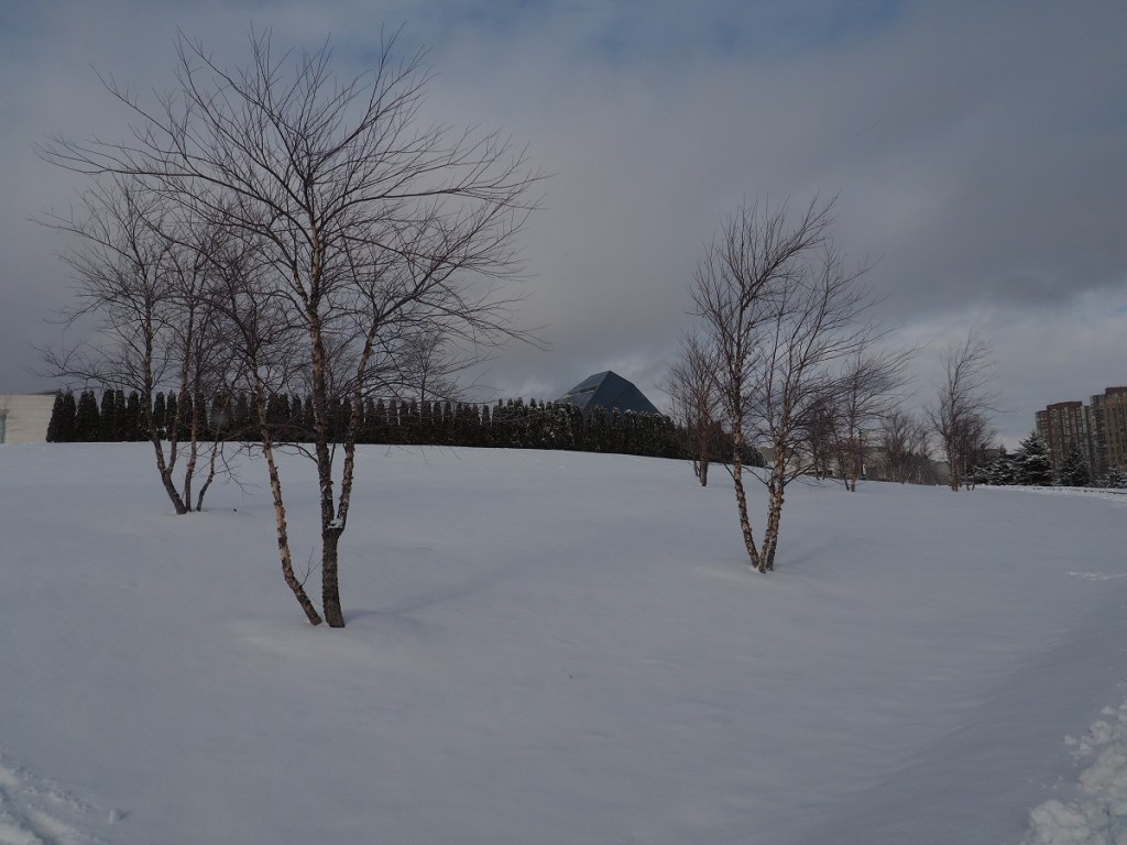 Aga Khan Park, Aga Khan Museum and the Ismaili Centre on white Xmas Christmas Friday December 25, 2020. Simergphotos Simerg and Barakah Malik Merchant.