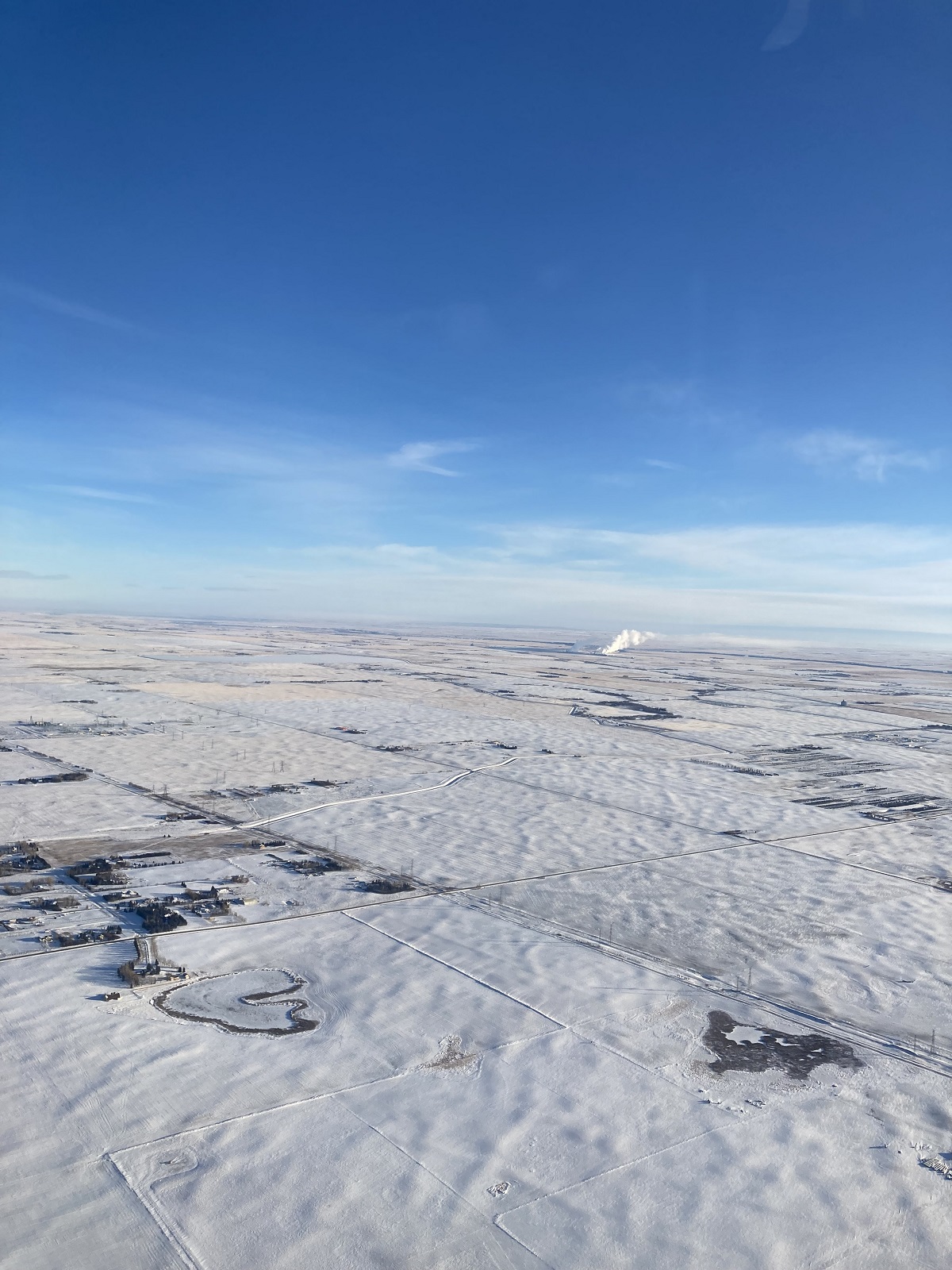 The frozen Prairies, a view from the plane; January 4, 2022. Photo: Malik Merchant/Simergphotos.