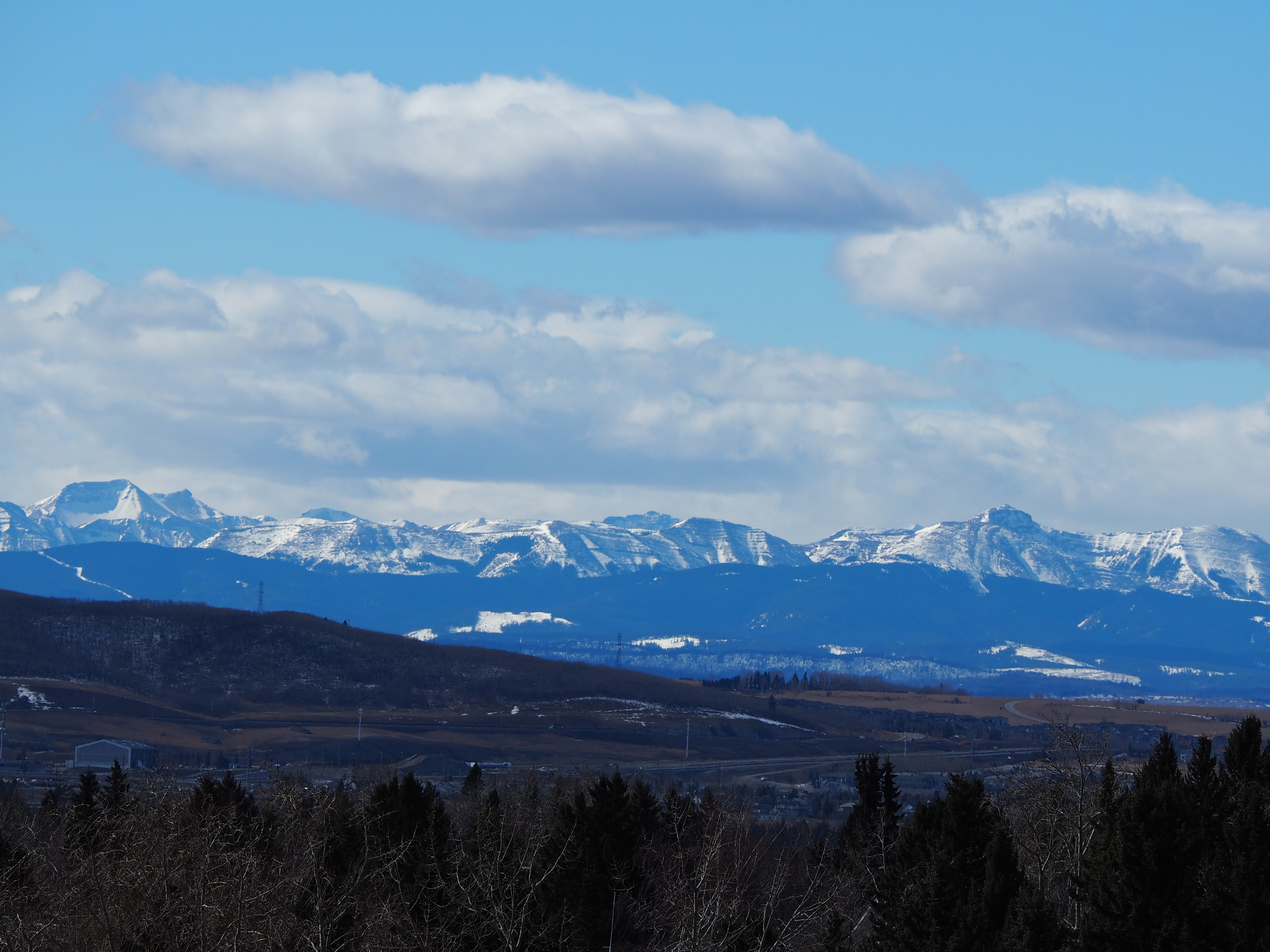 A view of the Canadian Rockies from Calgary's Edgemont Disc Golf Course, John Laurie Park, Malik Merchant Simerg photos, Navroz post