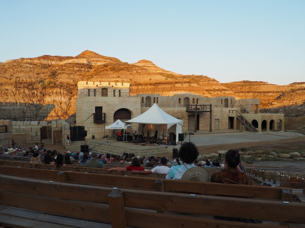   Allison Russell performs an inspirational concert singing her folks, blues and roots music, with the rugged terrain forming a backdrop at the Badlands Amphitheatre