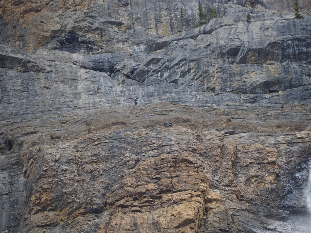Rock climbers Takakkaw Falls, Yoho National Park, Canada