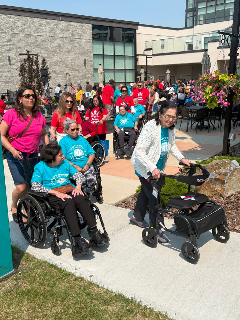 Care residents on walkers and wheelchairs in support of the Aga Khan Foundation World Partnership Walk, Generations Calgary, June 8, 2025. Photograph: Malik Merchant / Simerg Photos.