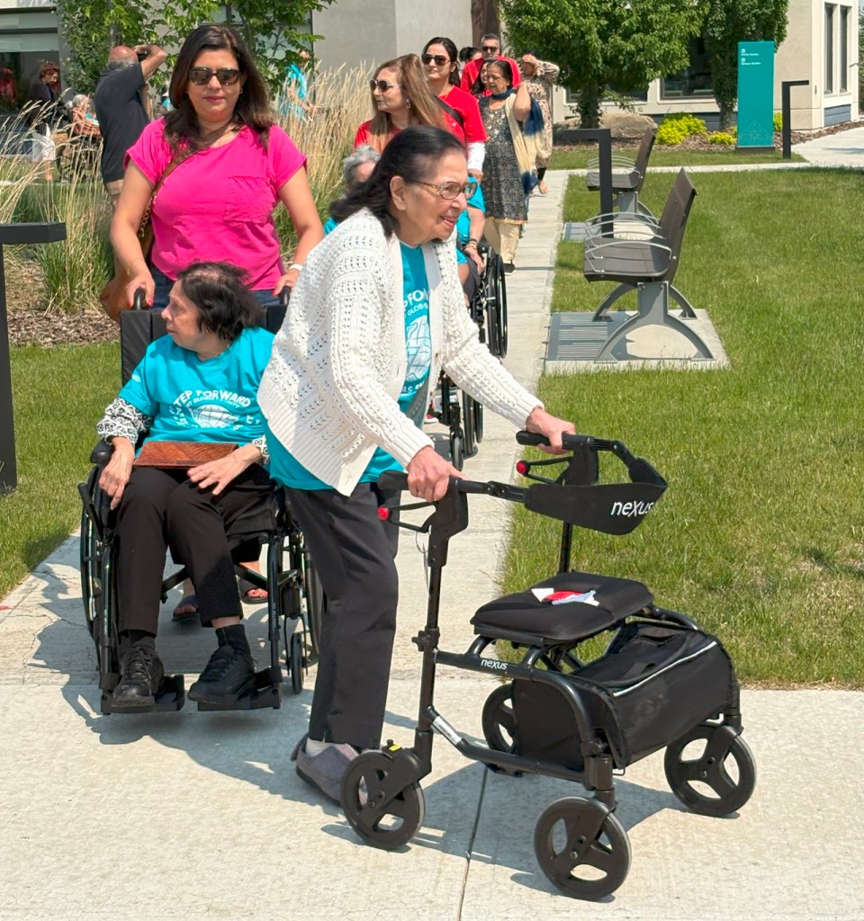 Care residents on walkers and wheelchairs in support of the Aga Khan Foundation World Partnership Walk, Generations Calgary, June 8, 2025. Photograph: Malik Merchant / Simerg Photos.
