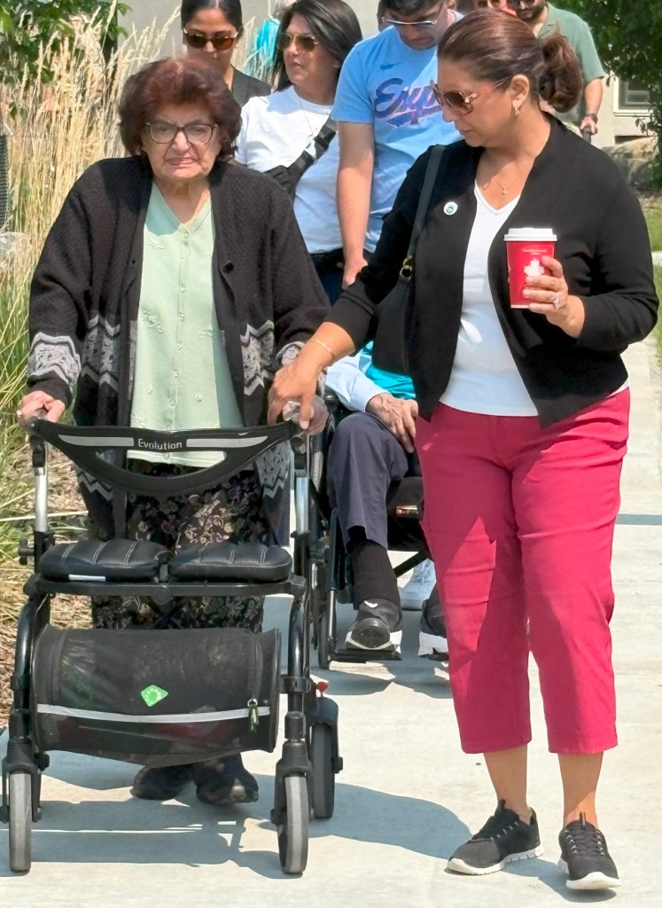 Care residents on walkers and wheelchairs in support of the Aga Khan Foundation World Partnership Walk, Generations Calgary, June 8, 2025. Photograph: Malik Merchant / Simerg Photos.