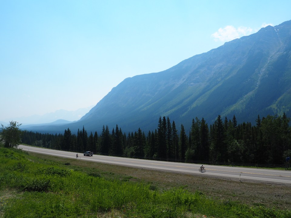View from Grizzly Creek as cyclists and motorists share the Kananaskis Trail, Alberta, Canada, July 2026. Photograph: Malik Merchant / Simergphotos.